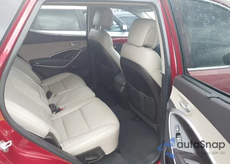 2014 Hyundai Santa Fe Sport 2.4L z USA, uszkodzony, nr VIN 5XYZUDLBXEG170657